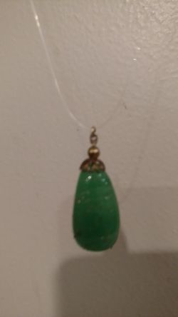 Very unique jade and gold pendant