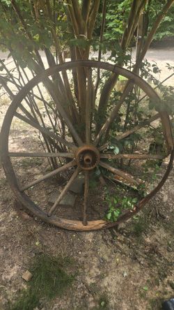 LARGE ANTIQUE HEAVY STEEL AND WOOD WHEEL