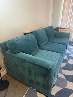Teal/blue couch