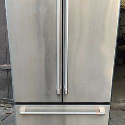 Very Nice! G.E. Profile Stainless Steel Side-By-Side Refrigerator!