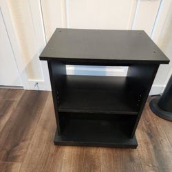 Black side table/end table with 4 wheels,Black, Wood, 23.5x20x16 inch, good condition, strong and sterdy