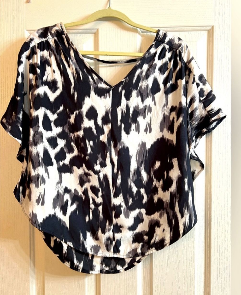 Express Woman’s Silk Leopard Print Batwing Blouse, Size Medium.