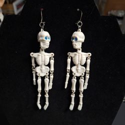 Novelty Articulated Plastic Skelton 4" Dangle Earrings With Blue Gemstone Eyes