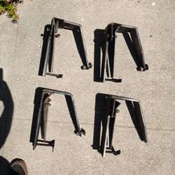 Truck bed camper brackets