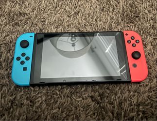 Nintendo Switch with Neon Joy-Cons And Charger