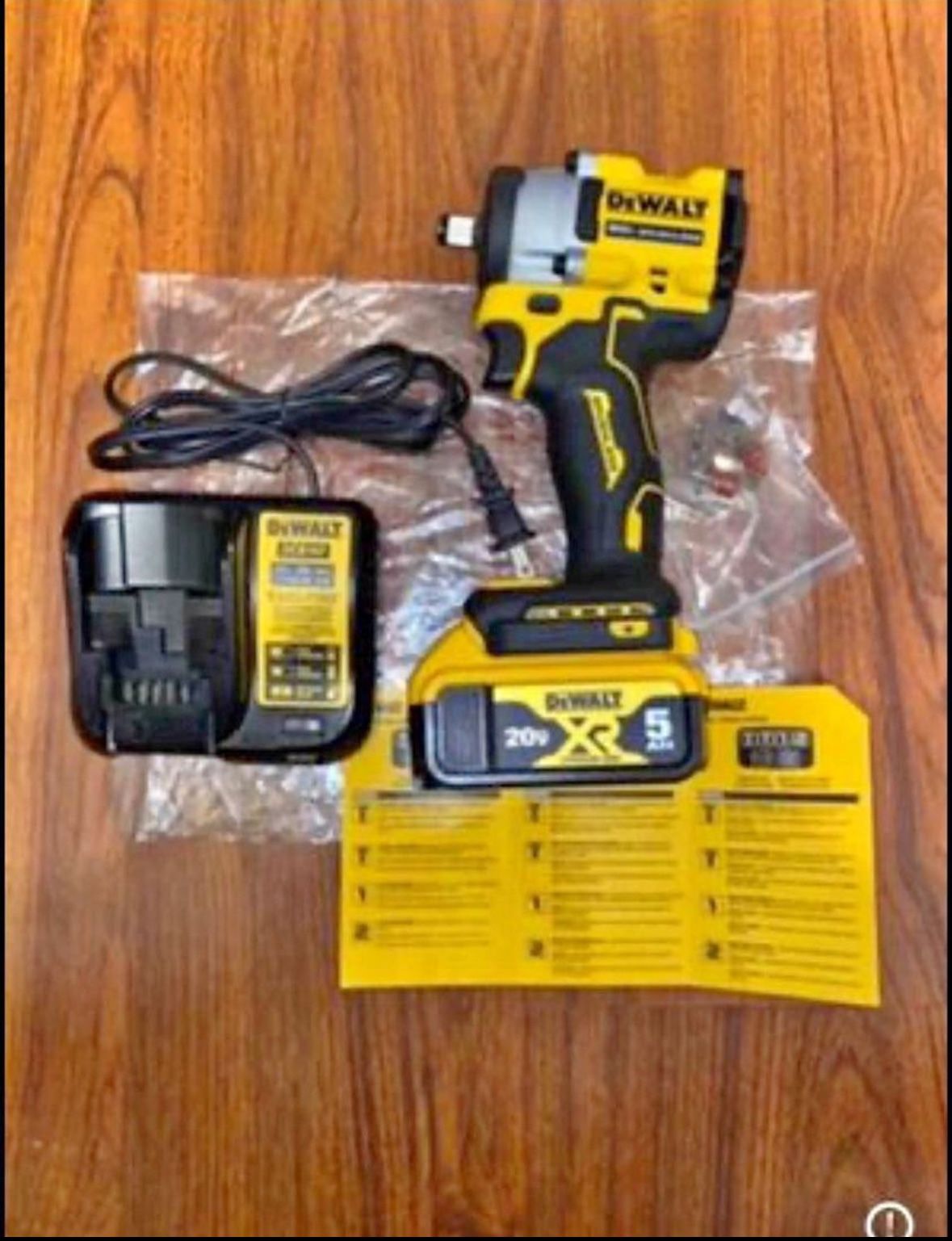 (1)Dewalt 20v Max Brushless 1/2 Atomic Compact Impact Wrench (DCF921) (1)20v Max 5.0 Ah