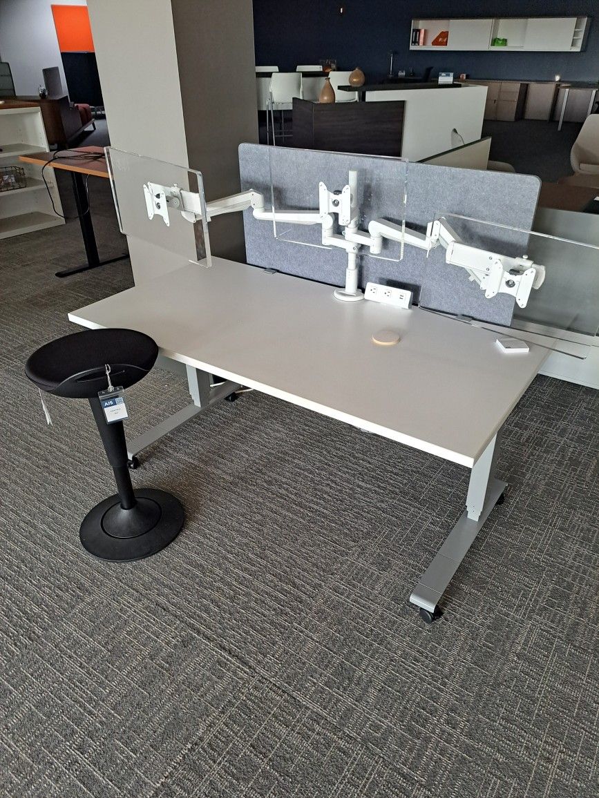 Multiple sit stand desks