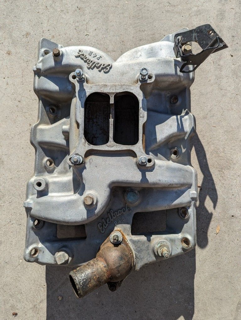 Early Model Edelbrock Pontiac Intake Manifold Aluminum. Fits 326, 350