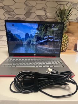 Selling a red HP laptop in good working condition. Great for schoolwork, streaming, and everyday browsing