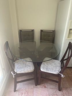 Used oak table with 4 chairs