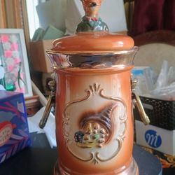 Price 12-year-old Brooks turkey bottle and a 1977 Jim Beam cookie jar available for purchase.