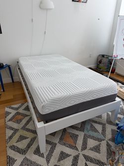white twin platform bed with memory foam mattress