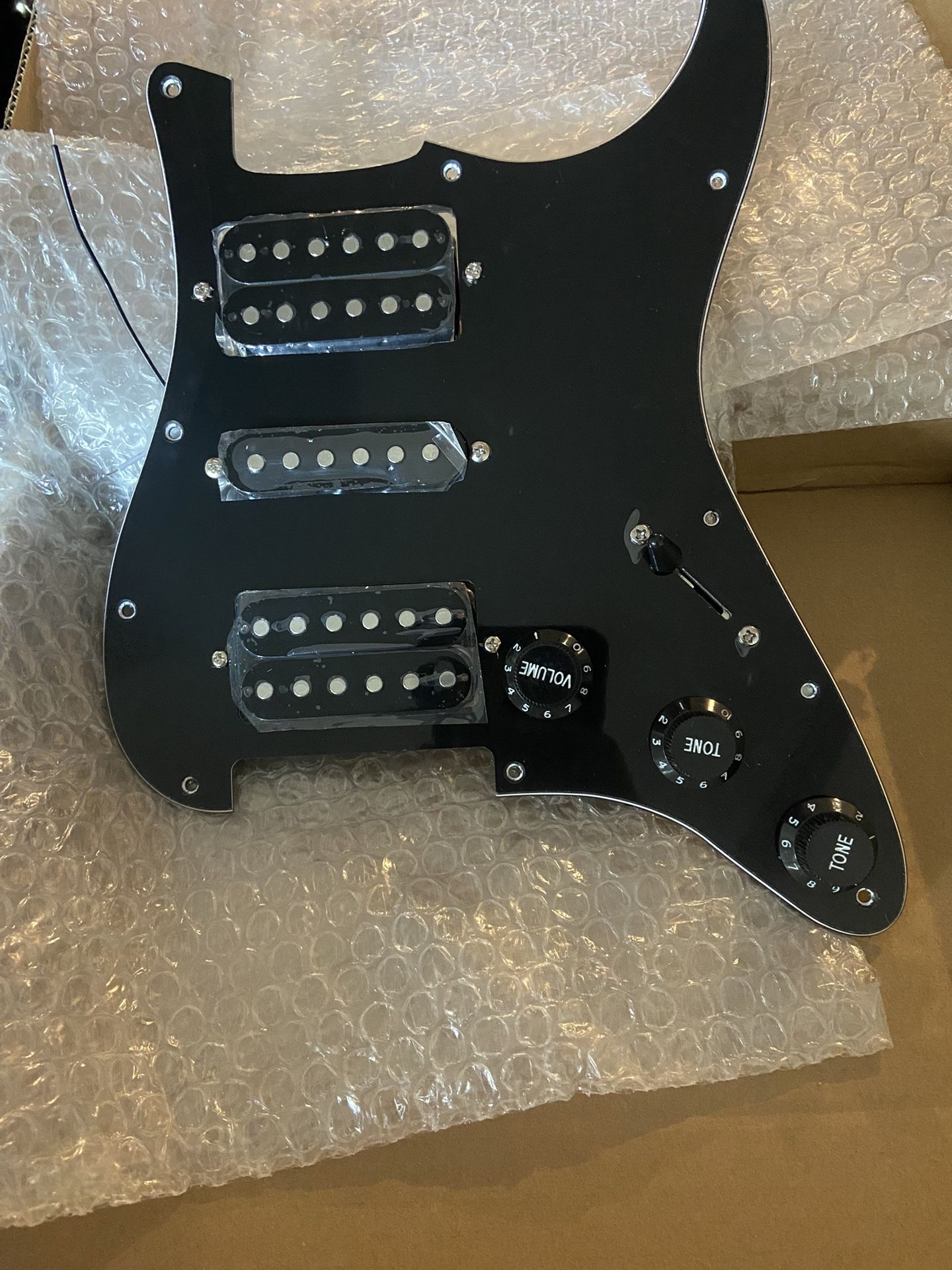prewired pickguard for a electric guitar