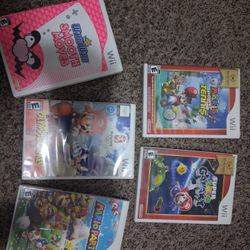 MARIO'S Wii GAMES. $20 EACH.
