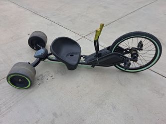 The Huffy Green Machine. classic drift trike designed for extreme 180-degree spins and sidewalk drifting. good condition.