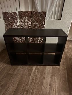 Dark brown wood shelf