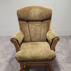 Dutailer rocking chair.  Made by Amish ppl