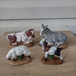 4 Vintage Atlantic mold figurines 