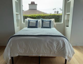 Full brand new queen beds and rugs