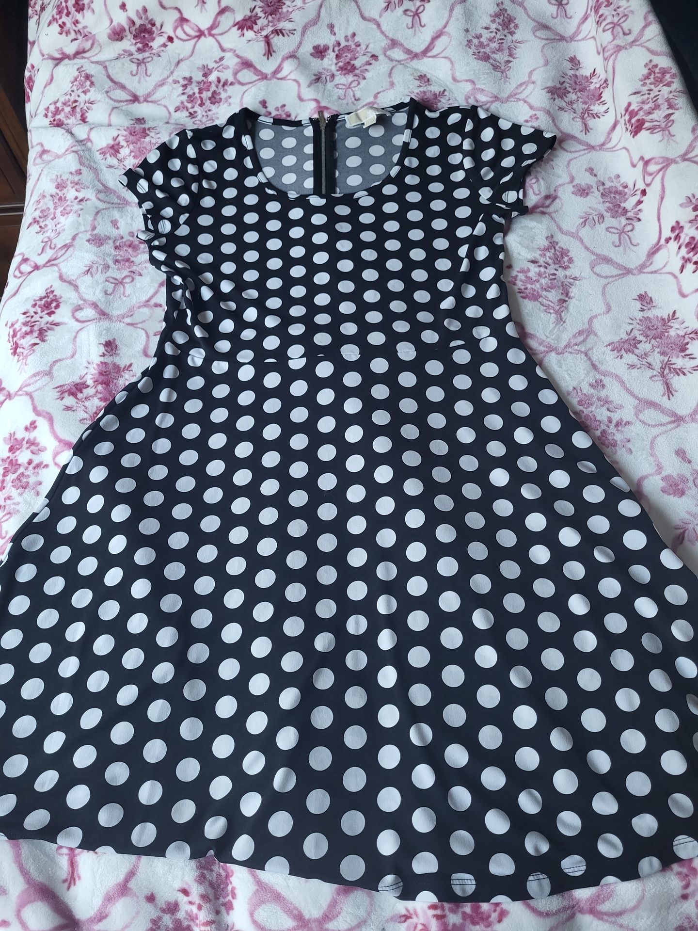 Michael Korrs black dress white poka dots size with a large and easy zipper