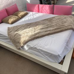 Queen-size bed and mattress