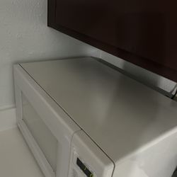 Microwave and Couch for sale 
