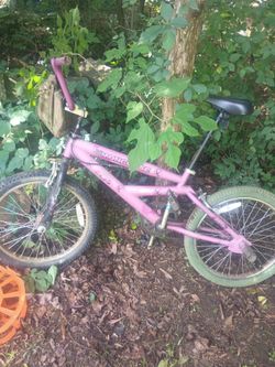 Pink mongoose trick bike