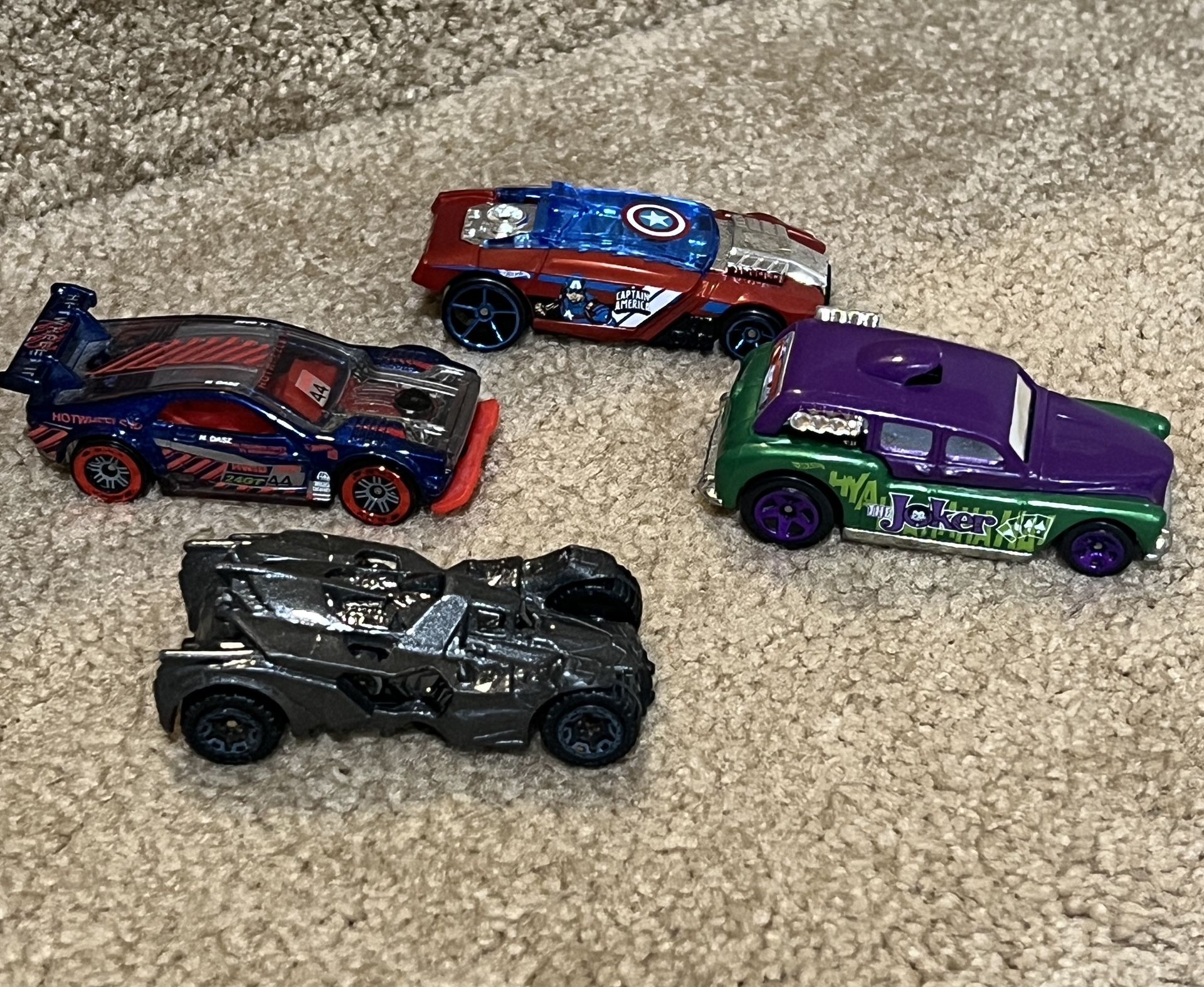 Hot Wheels Die cast Cars Joker Batmobile Captain America Power 24 GT lot of 4