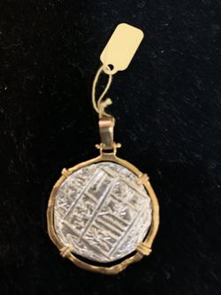 Atocha silver Coin pendent in gold bezel