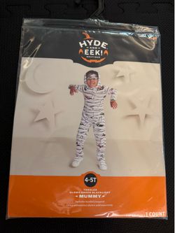 TODDLER GLOWS UNDER BLACKLIGHT • MUMMY