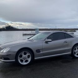 Mercedes SL (contact info removed).     Silver