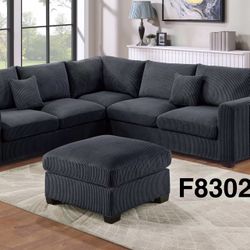 BLACK OR GREY SECTIONAL AND OTTOMAN 