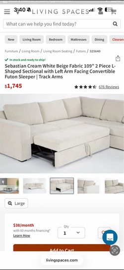 Cream sectional sleeper sofa - living spaces