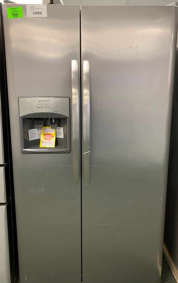Frigidaire side-by-side refrigerator!! All new with warranty S64