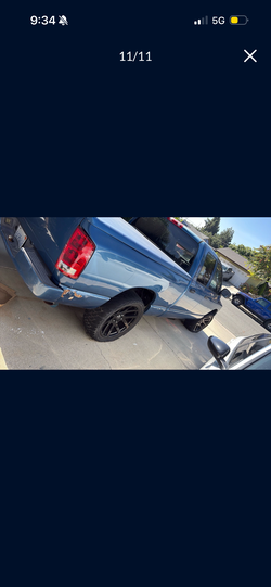 Blue Dodge Ram 1500 Black Rims