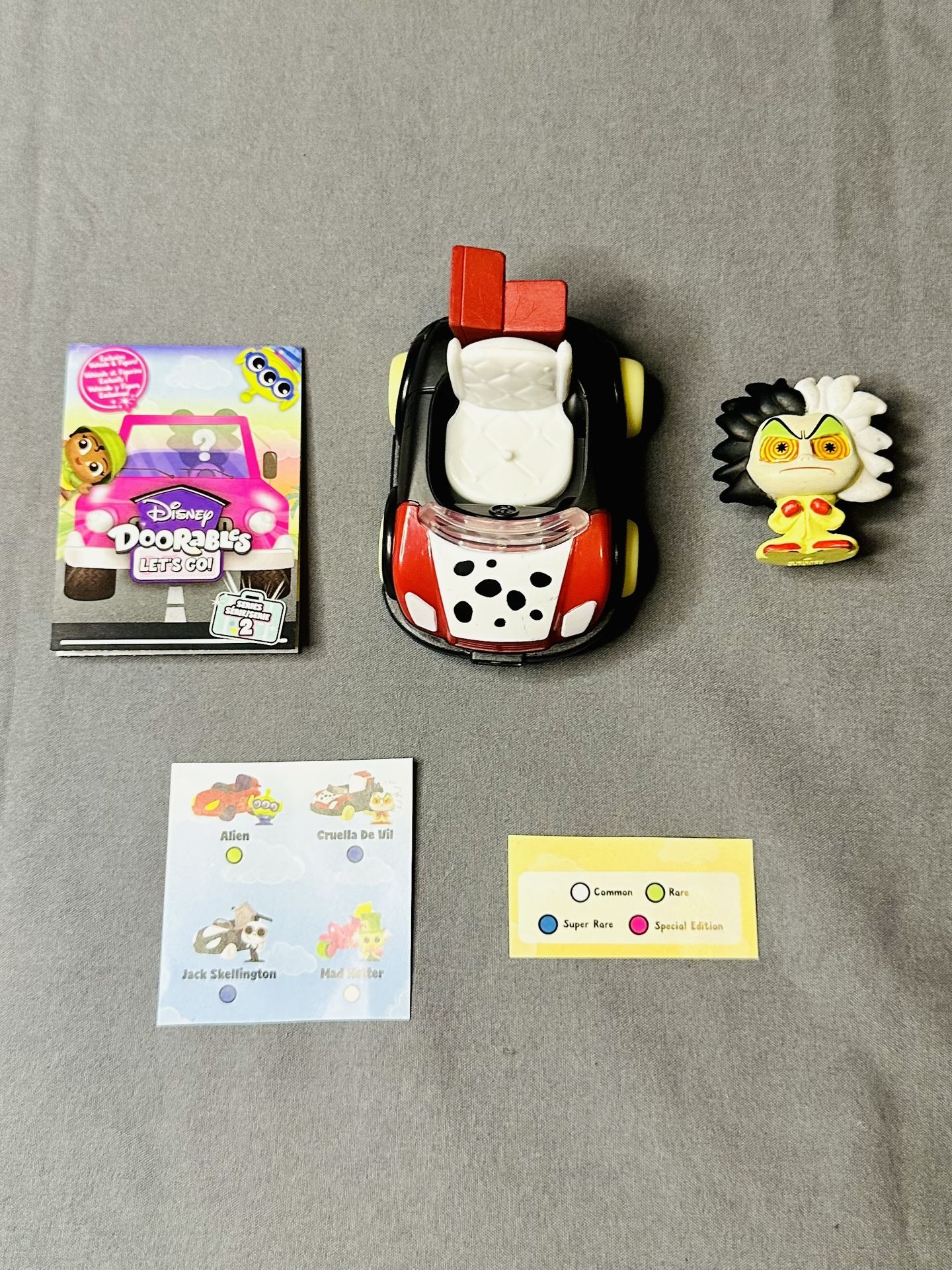 Disney Doorables Let’s Go Cars Series 2 - Cruella Deville (Ultra Rare)