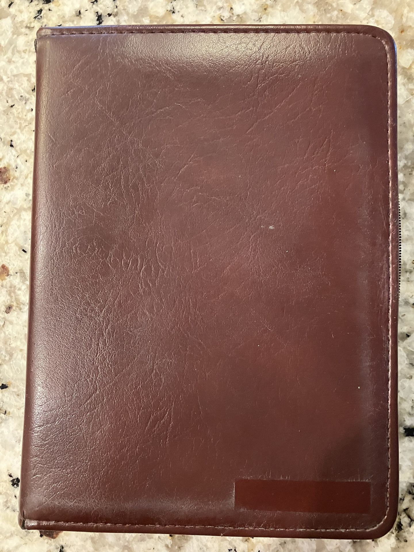 3-Ring Day-Timer planner binder with zipper closure.