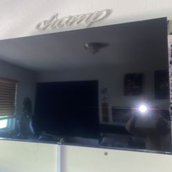 58" Hisense flat screen Smart TV and with Extension Mount