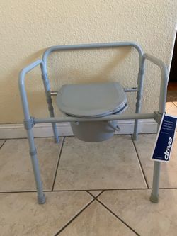 New Never used folding commode ( made by drive )