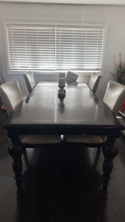 Wooden table with chairs