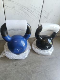 PAIR  KETTLEBELLS.   "READ"