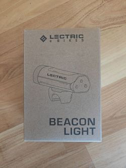 Lectric eBike Beacon light also act had phone charger.