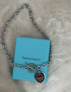 Tiffany & Co. necklace with heart-shaped tags