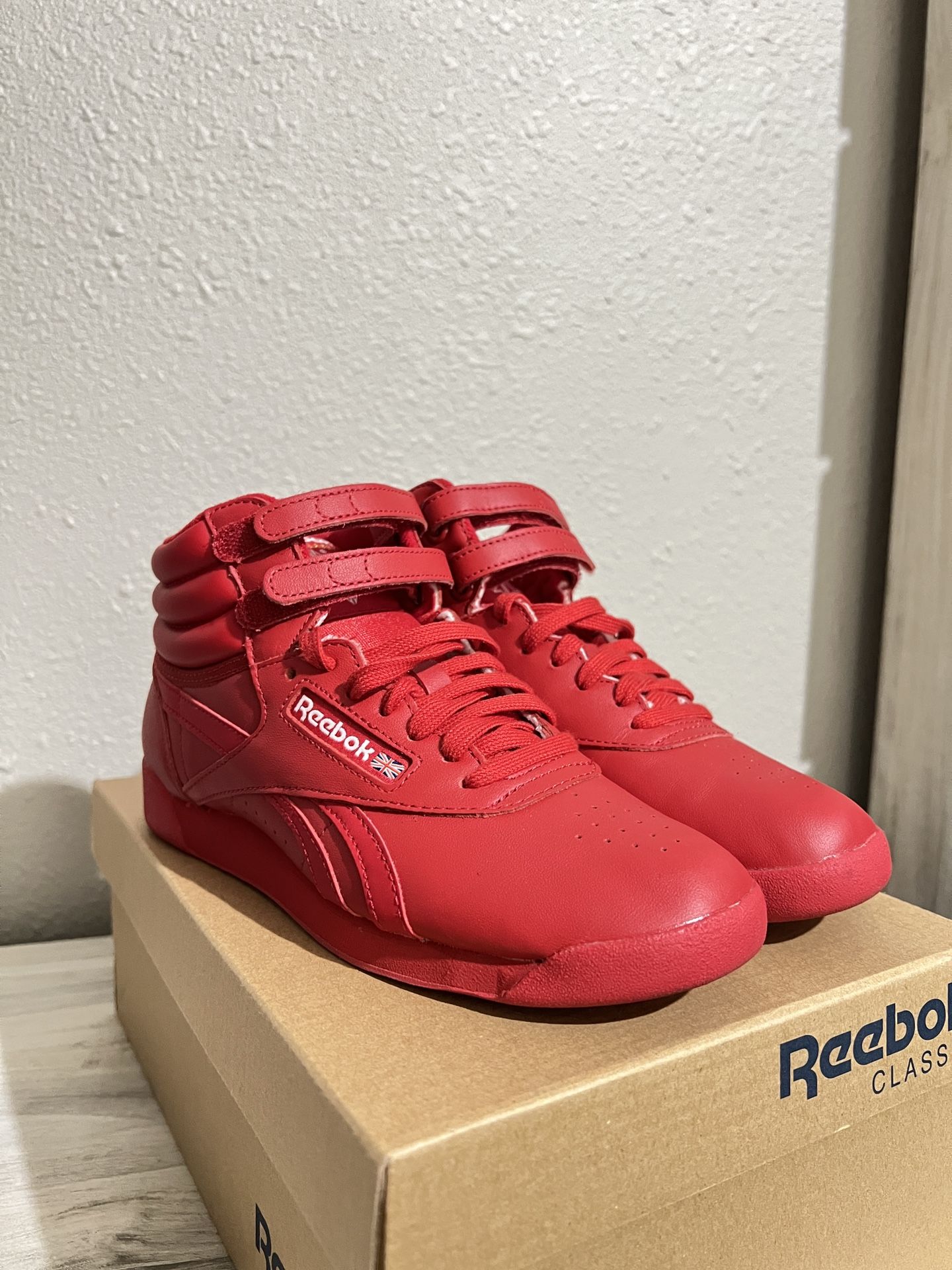 Reebok Women's Freestyle Hi High Top Sneaker