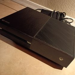 Xbox One Console With A Controller And Games