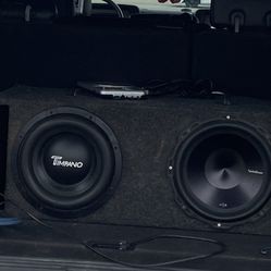 A Pair Of Non-Matching 12 Inch Subwoofers And 1500 W Amp