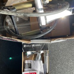 Delta Bath Faucet And Toilet Paper Holder