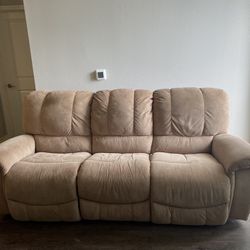Beige electric reclining couch