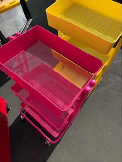 Two pink yellow Organizer carts