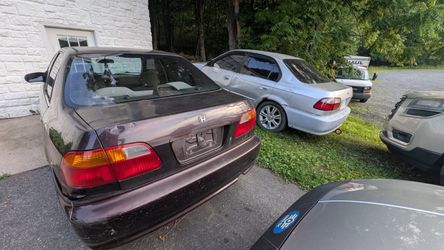 TRADE 2 Honda civics, for 1